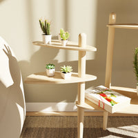 Étagère modulaire en bois clair à plusieurs niveaux pour plantes, conçue pour s'adapter et s'ajouter aux tables Canopée Design.